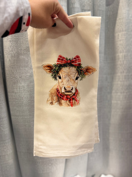 Christmas cow tea towel